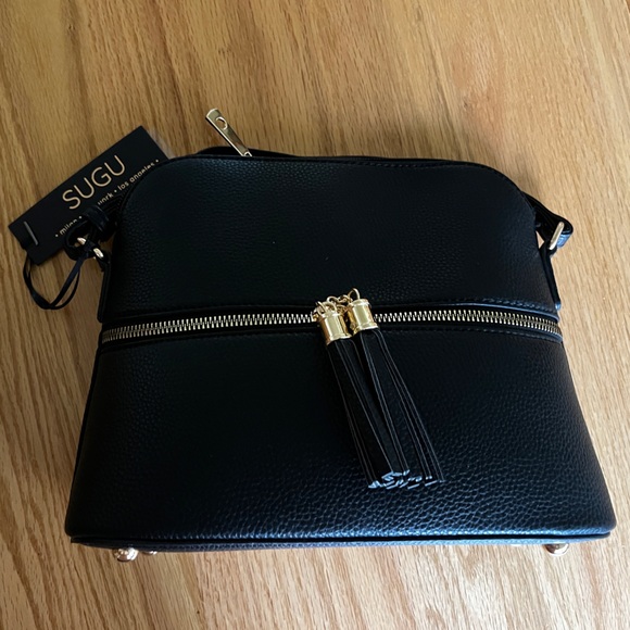 Black Crossbody Bag with Gold Tassel Accents - Picture 1 of 9